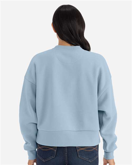 Stonewash Denim - Next Level 9087 Women's Sweatshirt with Logo Embroidery Next Level Women's Heavyweight Crewneck Sweatshirt in Stonewash Denim, back view on model