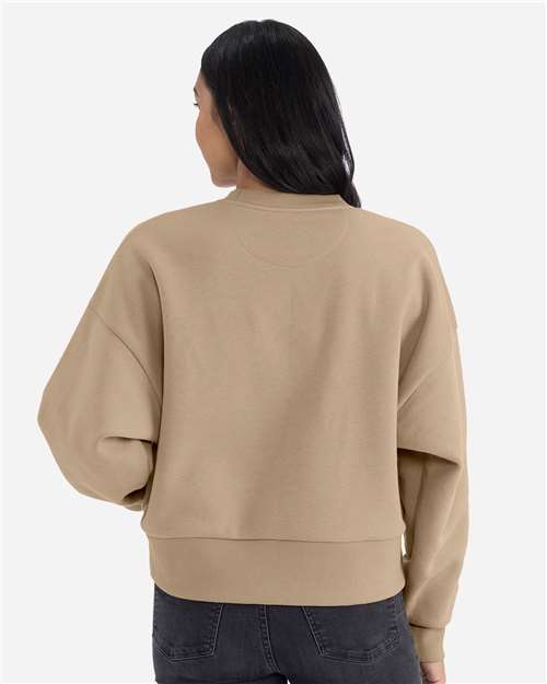 Tan - Next Level 9087 Women's Sweatshirt with Logo Embroidery Next Level Women's Heavyweight Crewneck Sweatshirt in Tan, back view on model