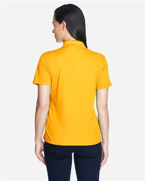Campus Gold - CORE365 78181 Women's Polo with Embroidered Company Logo CORE365 Women’s Polo in Campus Gold, back view on model