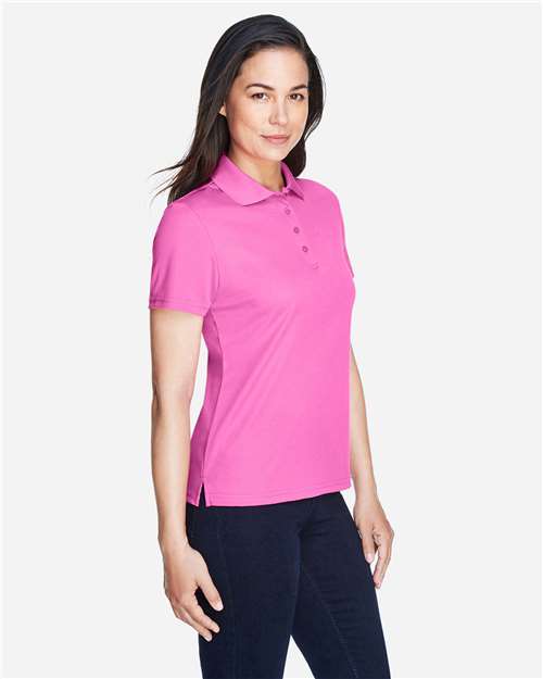 Charity Pink - CORE365 78181 Women's Polo with Embroidered Company Logo CORE365 Women’s Polo in Charity Pink, side view on model