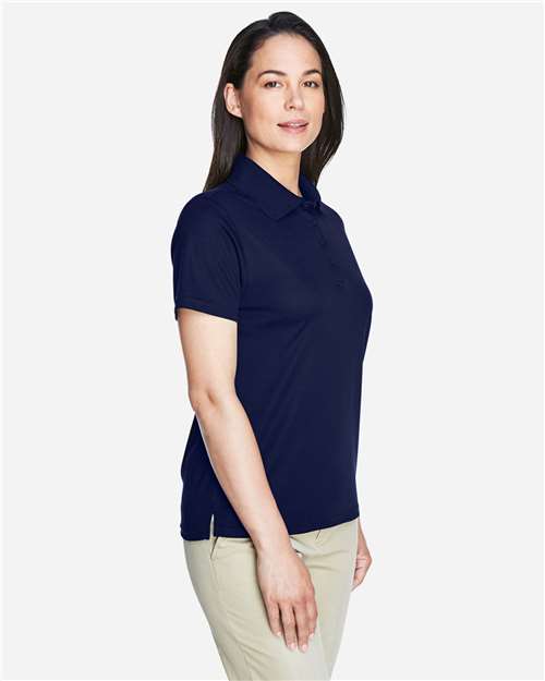 Classic Navy - CORE365 78181 Women's Polo with Embroidered Company Logo CORE365 Women’s Polo in Classic Navy, side view on model