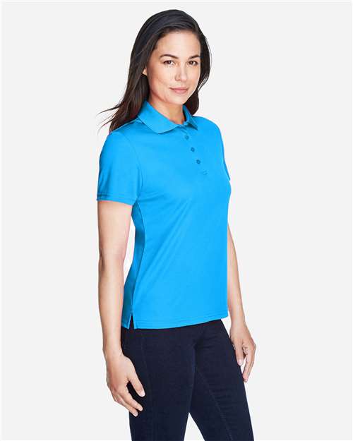 Electric Blue - CORE365 78181 Women's Polo with Embroidered Company Logo CORE365 Women’s Polo in Electric Blue, side view on model
