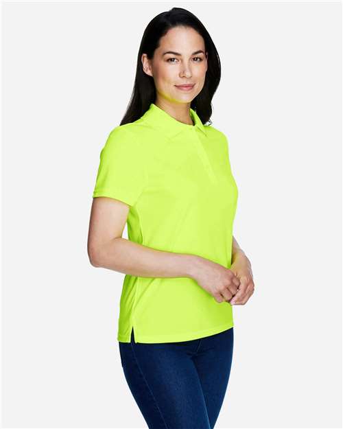 Safety Yellow - CORE365 78181 Women's Polo with Embroidered Company Logo CORE365 Women’s Polo in Safety Yellow, side view on model