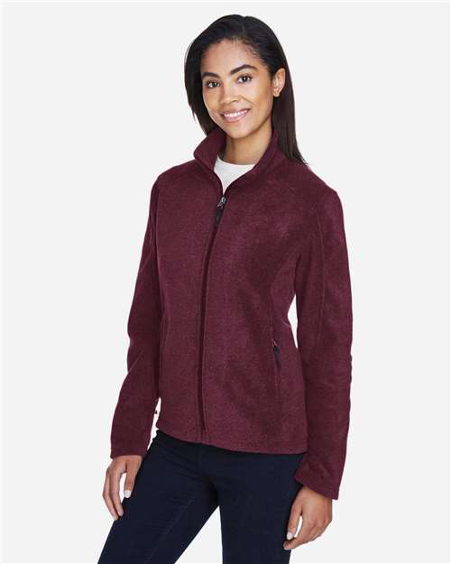 Burgundy - CORE365 78190 Women's Jacket with Embroidered Company Logo CORE365 Women's Journey Fleece Jacket in Burgundy, side view on model