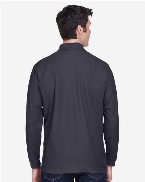 Navy - Devon & Jones D110 Men's Long Sleeve Polo with Company Logo Devon & Jones Men’s Long Sleeve Polo in Navy, back view on model