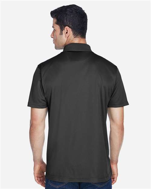 Black - Harriton M315 Men's Polo with Embroidered Company Logo Harriton Men's Polyester Jersey Polo in Black, back view on model