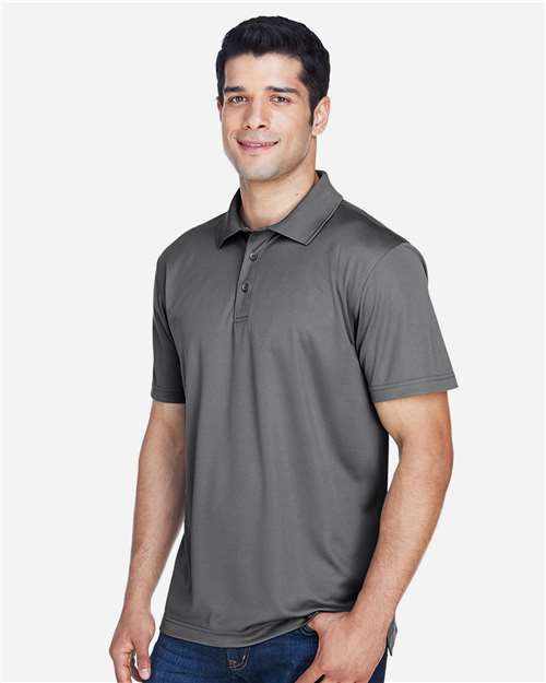 Charcoal - Harriton M315 Men's Polo with Embroidered Company Logo Harriton Men's Polyester Jersey Polo in Charcoal, side view on model