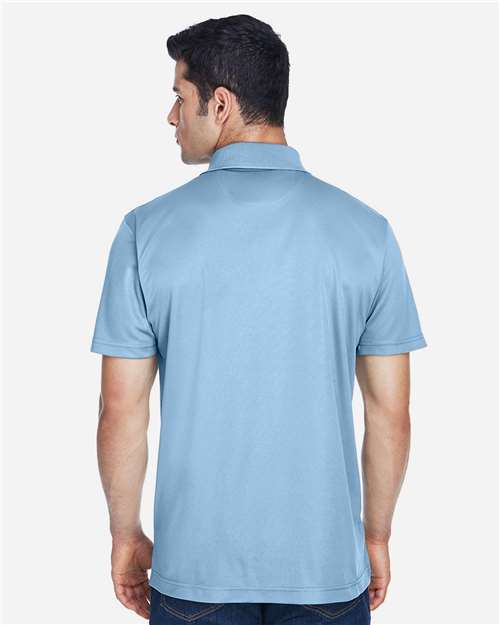 Light Blue - Harriton M315 Men's Polo with Embroidered Company Logo Harriton Men's Polyester Jersey Polo in Light Blue, back view on model