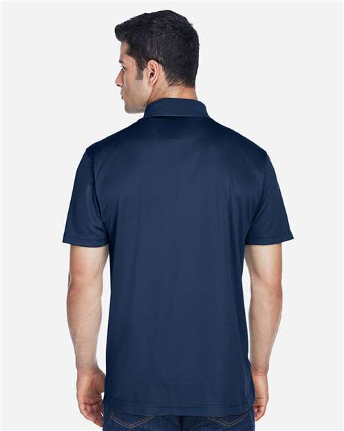 Navy - Harriton M315 Men's Polo with Embroidered Company Logo Harriton Men's Polyester Jersey Polo in Navy, back view on model