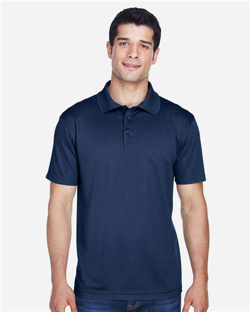 Navy - Harriton M315 Men's Polo with Embroidered Company Logo Harriton Men's Polyester Jersey Polo in Navy, front view on model