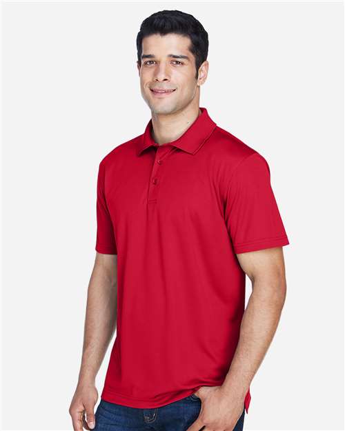 Red - Harriton M315 Men's Polo with Embroidered Company Logo Harriton Men's Polyester Jersey Polo in Red, side view on model