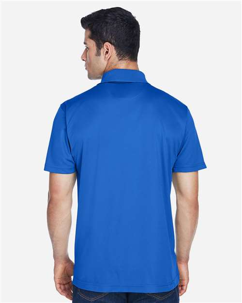 True Royal - Harriton M315 Men's Polo with Embroidered Company Logo Harriton Men's Polyester Jersey Polo in True Royal, back view on model