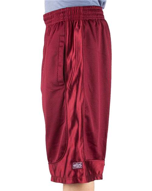 Burgundy - Shaka Wear Unisex Mesh Shorts with Custom Logo Embroidery Shaka Wear Unisex Mesh Shorts in Burgundy, side view on model