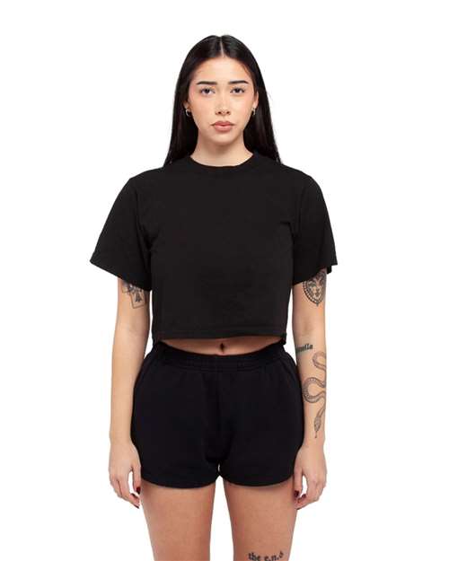 Black - Women's Garment-Dyed Cropped Tee Shaka Wear Women's Garment-Dyed Cropped Tee in Black, front view on model