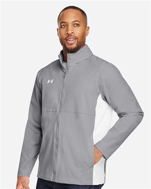 Mod Grey/ White - Under Armour 1390159 Men's Jacket with Custom Embroidery Under Armour Men's Rival Stretch Jacket in Mod Grey/White, side view on model