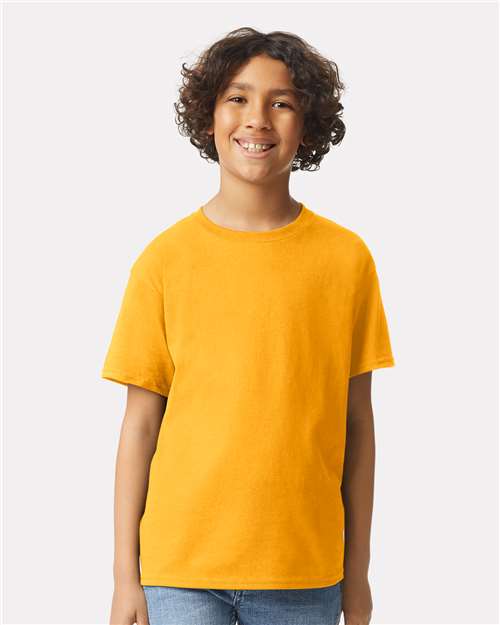 Gold - Gildan Youth Ultra Cotton® T-Shirt with Custom Printing Gildan Youth Ultra Cotton® T-Shirt in Gold, front view on model