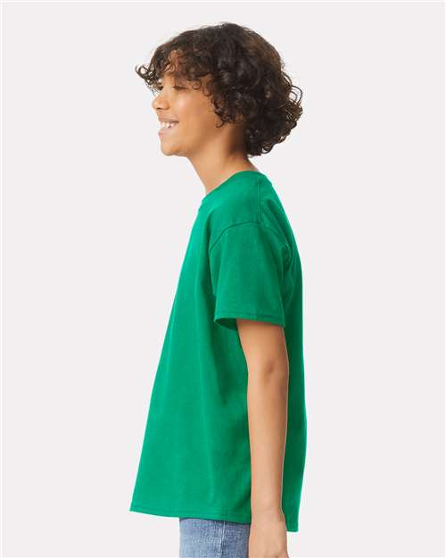 Kelly Green - Gildan Youth Ultra Cotton® T-Shirt with Custom Printing Gildan Youth Ultra Cotton® T-Shirt in Kelly Green, side view on model