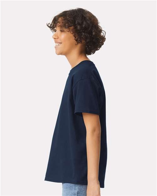 Navy - Gildan Youth Ultra Cotton® T-Shirt with Custom Printing Gildan Youth Ultra Cotton® T-Shirt in Navy, side view on model