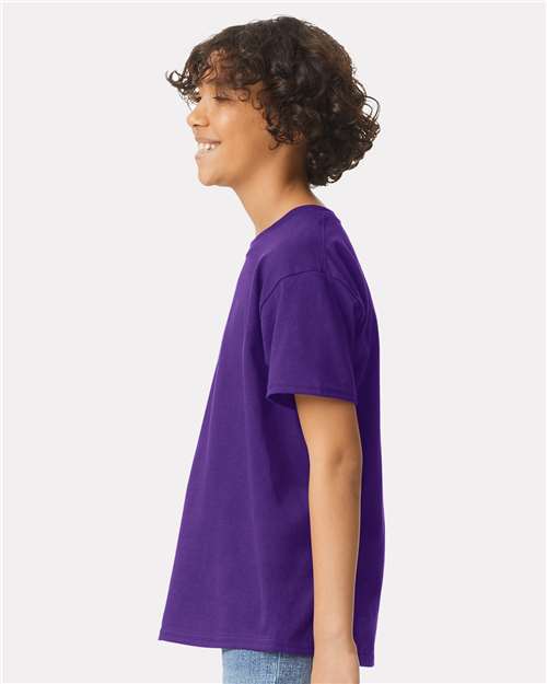 Purple - Gildan Youth Ultra Cotton® T-Shirt with Custom Printing Gildan Youth Ultra Cotton® T-Shirt in Purple, side view on model