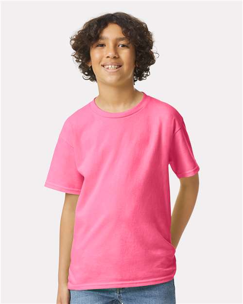 Safety Pink - Gildan Youth Ultra Cotton® T-Shirt with Custom Printing Gildan Youth Ultra Cotton® T-Shirt in Safety Pink, front view on model