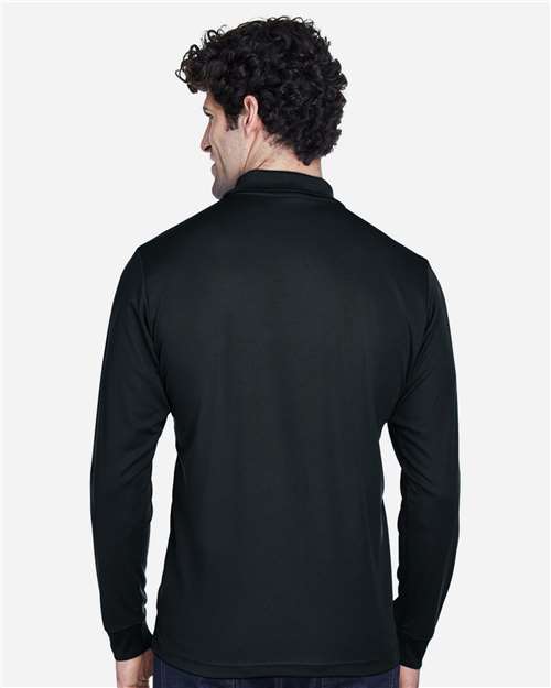 Black - CORE365 88192T Men's Polo with Embroidered Company Logo CORE365 Men's Tall Pinnacle Performance Long Sleeve Piqué Polo in Black, back view on model