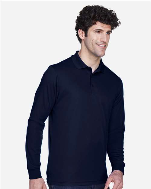 Classic Navy - CORE365 88192T Men's Polo with Embroidered Company Logo CORE365 Men's Tall Pinnacle Performance Long Sleeve Piqué Polo in Classic Navy, side view on model