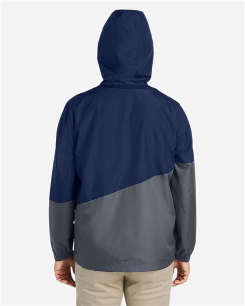 Classic Navy Heather/ Carbon - CORE365 CE710 Windbreaker Jacket with Custom Logo Embroidery CORE365 Unisex Techno Lite Colorblock Windbreaker in Classic Navy Heather/Carbon, back view on model